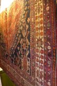 An extremely fine south west Persian Qashgai carpet 250cm x 160cm central double pendent medallion