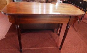 A pair of Georgian mahogany D end console tables raised on ring turned supports