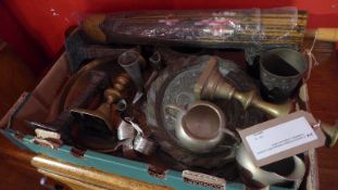 A Collection of Eastern metalware items including candlesticks, a chalice and others.