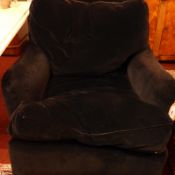 A George Smith armchair in the Howard and Sons manner, with brass makers label on underside,