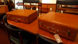 A pair of 1950's American Samsonite tan leather suitcases in very good condition.