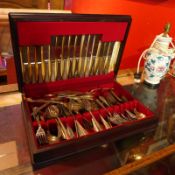 An extensive Sheffield silver plated canteen of cutlery in mahogany case.