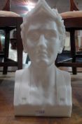 A resin bust of a man.