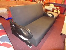 A cotemporary three seater sofa upholstered in black fabric and on painted elephant design supports