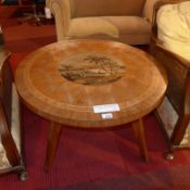 A Danish 1950's marquetry and parquetry inlaid low table, of circular form,