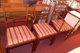 A Sheraton revival inlaid mahogany elbow chair with drop in seat together with two matching side