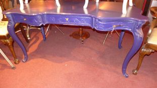A French Chippendale style blue painted writing table fitted three drawers on ball and clear