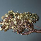 A collection of seven costume jewellery pieces including necklaces and bracelets,