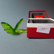 A Baccarat green glass butterfly in original presentation box.