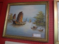 A contemporary oil on canvas, Japanese junks in a bay, in a gilt frame.