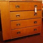 A military style light oak secretaire chest fitted four long drawers with inset brass handles and