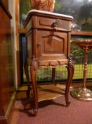 A pair of French 19th century walnut and marble topped pot cupboards,