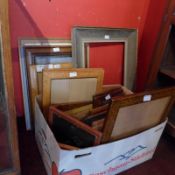 A large collection of various picture frames including maple and mahogany examples.