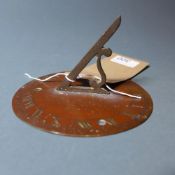 An 18th century bronze sundial 'Sunny Hours'.