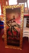 A German painting on glass, study of a cage dancer, in a carved and painted frame.