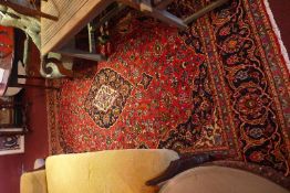 A fine central Persian Kashan carpet 335cm x 212cm central with repeating Shah Abbas spandrels on a