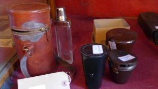 A vintage silver plated travelling decanter set in leather case together with a set of Swedish