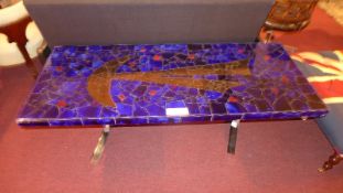 A 1950's low / coffee table with mosaic style tiled top,