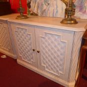 A contemporary faux marble side cabinet (to match lot 570) fitted pair of trellis panel doors.