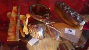 A Chinese silver three piece dressing table set having dragon detail in relief together with a