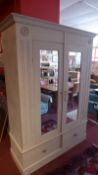 A French grey painted distressed finish pine armoire fitted pair of mirrored doors enclosing