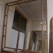A 19th Continental wall mirror the square plate within gilt and gesso marginal frame with leafy