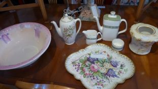 a Continental quatrefoil porcelain tray decorated with flowers, a large wash basin,