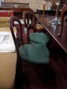 A harlequin set of six Victorian mahogany dining chairs.
