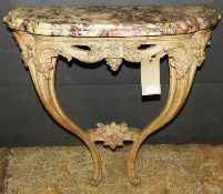 A 19th Century French giltwood and painted console table of small proportions, the variegated marble