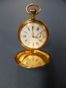 An 18k gold hunter pocket watch, enamel dial with subsidiary dial, finely chased floral decoration