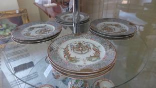 A set of twelve Japanese 19th Century armorial porcelain plates, six character marks to base