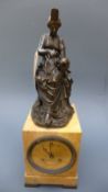 A 19th Century French mantle clock by Lesieur, the bronze classical lady supported on variegated