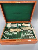 A complete 57 piece Mappin and Webb silver cutlery service in original oak fitted case, London 1932