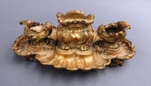 A French Rococo gilt metal inkwell