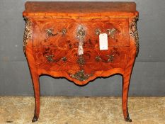 An early 20th Century kingwood walnut and marquetry inlaid secretaire bombe commode, the fitted