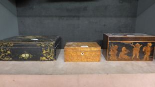 A George III yewwood and parquetry box with inset pictorial front panel of cupids playing musical