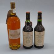 A magnum bottle of Chateau Coutet a Barsac together with a pair of Chateau Gruand Larose St Julien