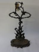 A 19th Century Victorian Coalport design cast iron stick stand with naturalistic decoration