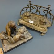 An Art Nouveau silver plated desk stand with stylised foliage detail in relief and a cast metal