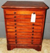 A late 19th Century Victorian Howard and Sons mahogany specimen chest of ten drawers with bun