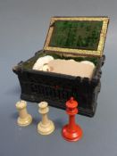 A fine Jaques of London chess set together with original carton pierre box