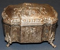 A late 19th Century Dutch silver casket decorated with repousse maiden and putti
