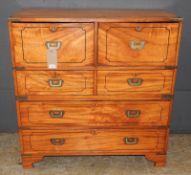 A 19th Century satinwood and inlaid campaign chest, having an arrangement of various drawers, to