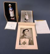 A Royal Worcester model of red cross VAD member 250/750 with original paperwork and ephemera