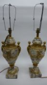 A pair of 19th Century white and grey variegated marble cassolette lamps of urn form with ormolu