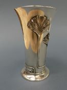 An Art Nouveau 19th Century silver vase with inscribed detail and leaf decoration H.18cm