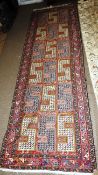 An antique Soumak zeleh runner, the all over vibrant dragon design on ruby ground within multiple