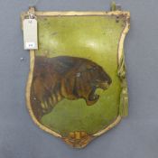 A pair of enamel hand painted double sided hanging shield plaques, having wild cat decoration,