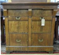 A 19th Century Northern European flame mahogany and walnut gentleman's dressing chest, the