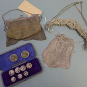 A collection of three 19th Century silver mounted mesh purses and a part set of cased silver buttons